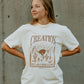 Creation Tan Tee
